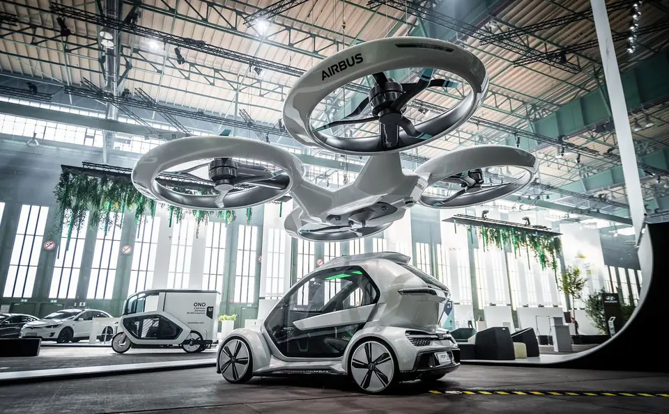 A drone-and-pod mobility concept on show in the hangar
