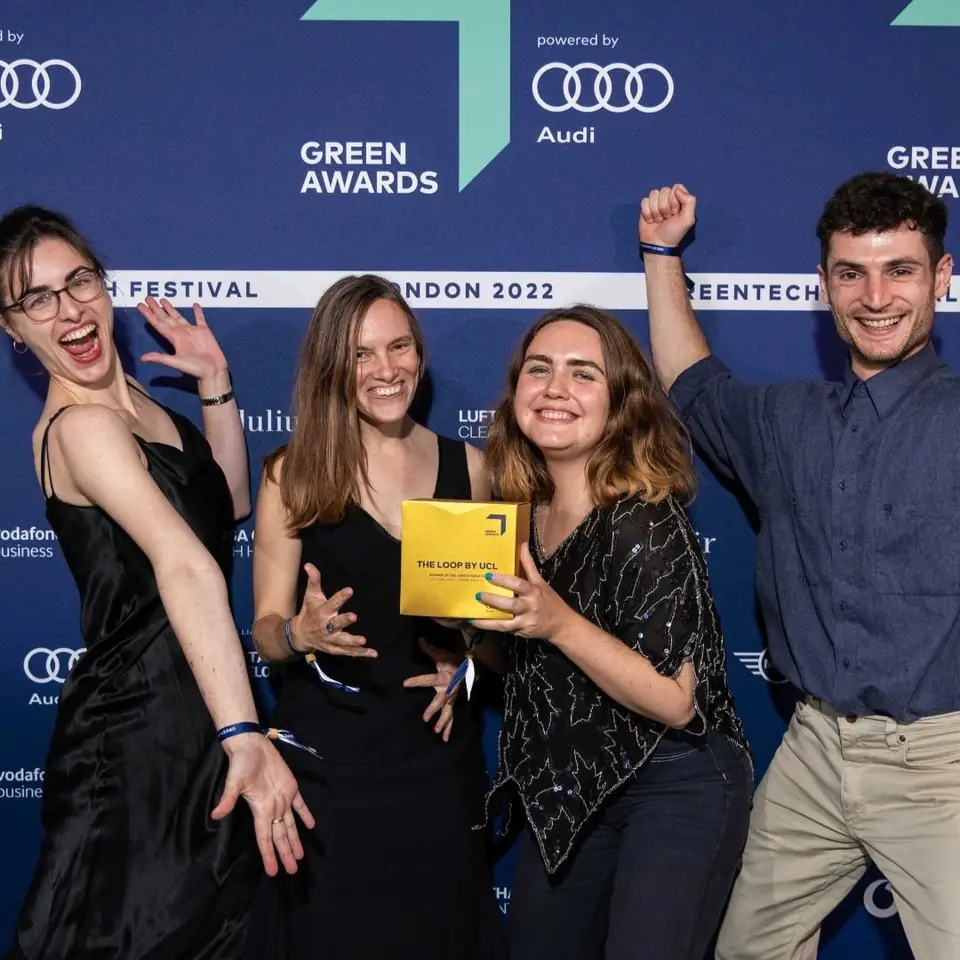 Winners celebrating at the GREEN AWARDS London 2022 wall