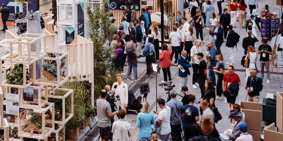 Visitors moving through the exhibition
